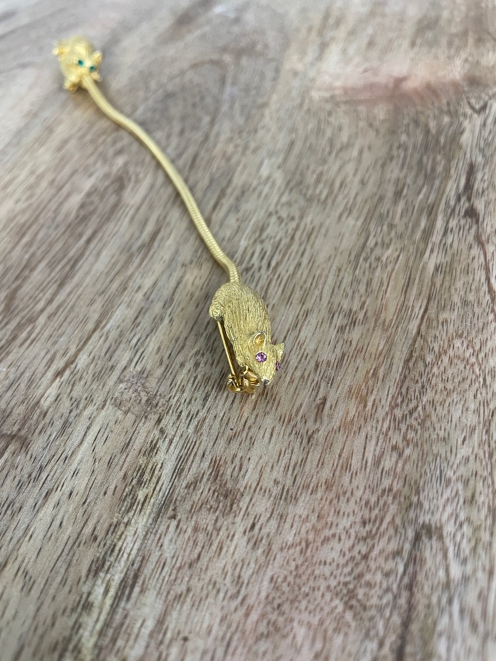 rare gold tone brooch, featuring a charming cat and mouse design